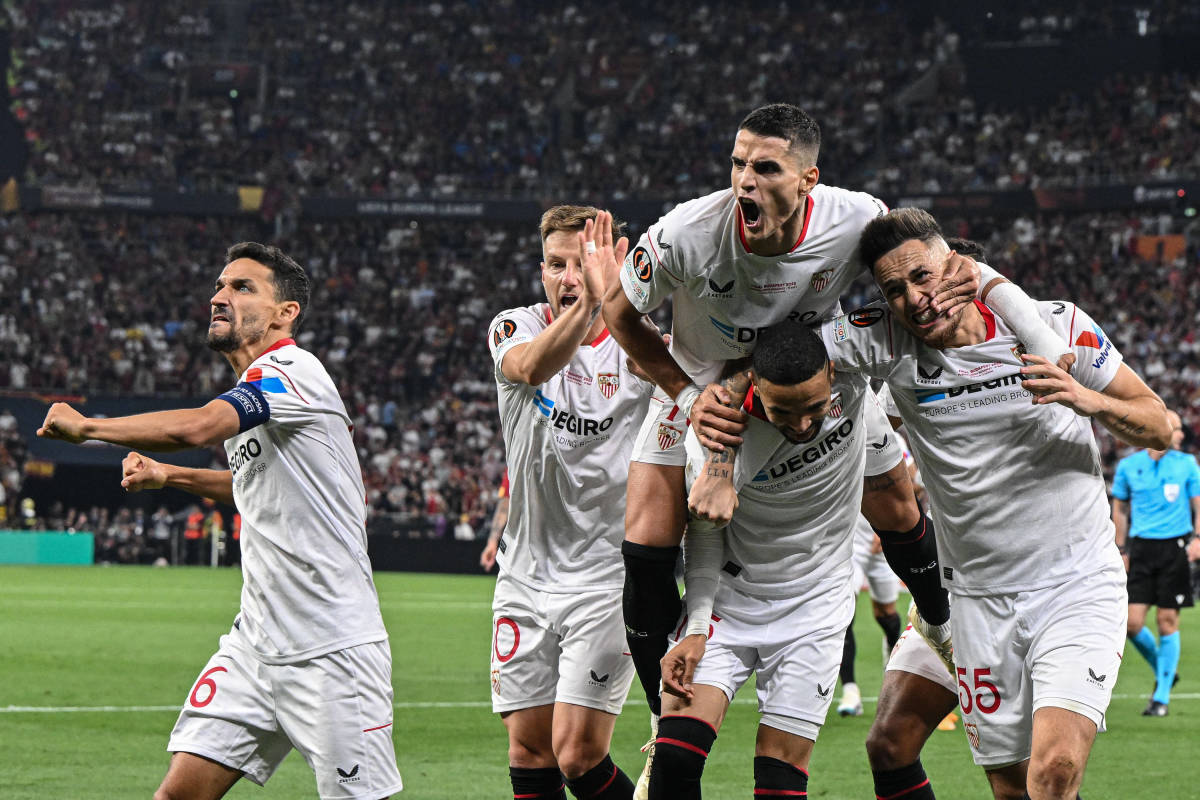Players from Sevilla pictured celebrating a goal against Roma in the 2023 UEFA Europa League final